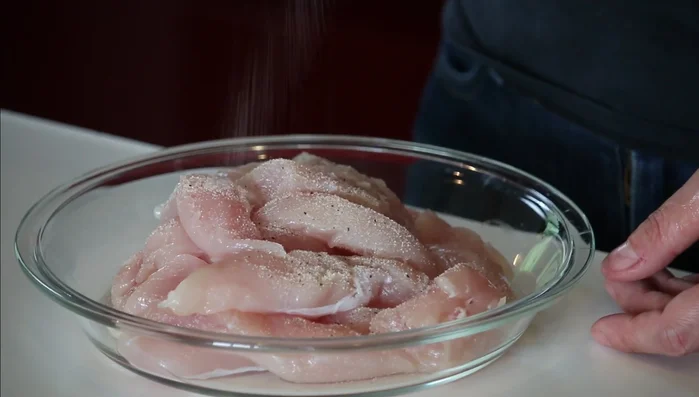 Season chicken with salt and pepper. Let it sit for 10 minutes.