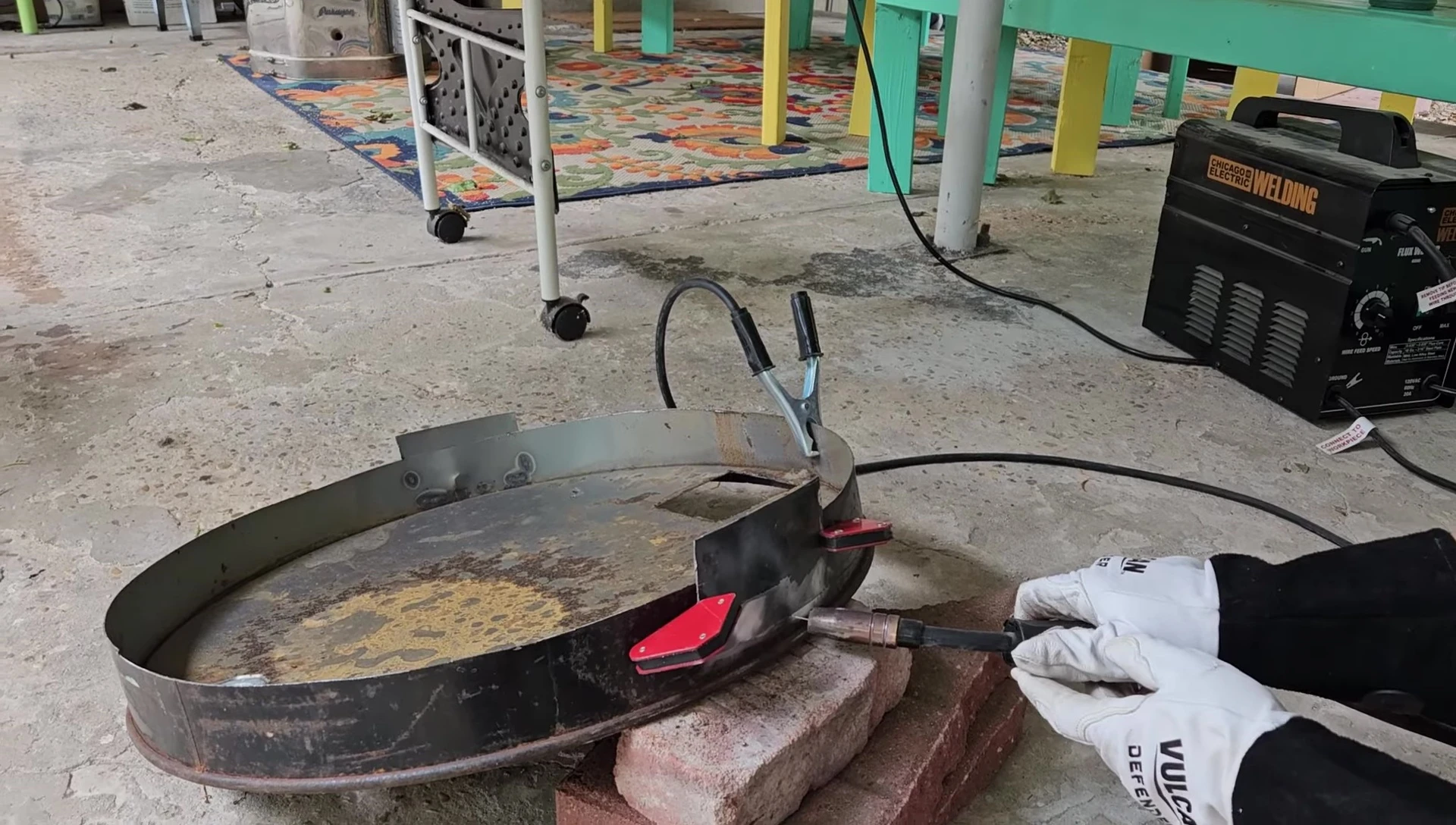 Welding metal flanges onto a barrel