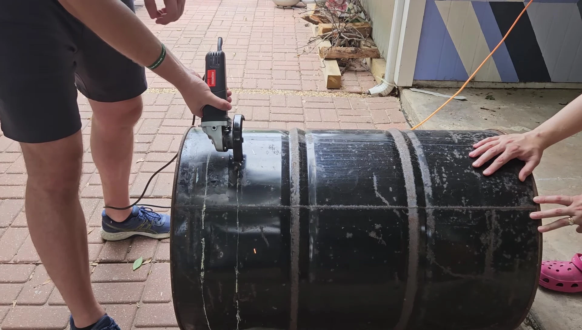 Cutting a barrel for Raku kiln
