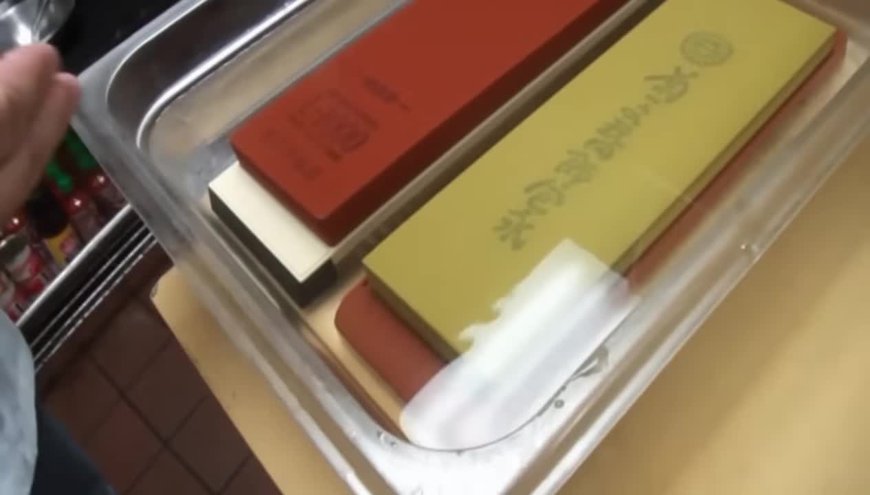 Whetstones soaking in water for sharpening.