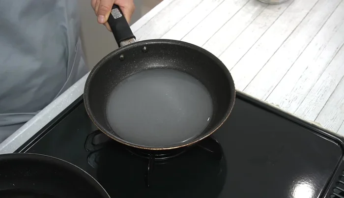 Heat the pan over medium heat. Do not stir the sugar too much; let it heat until the color changes.
