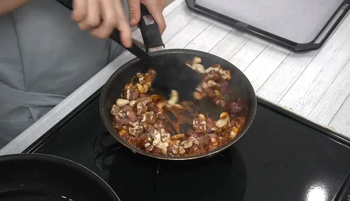 Add mixed nuts. Mix quickly off the heat to coat evenly.