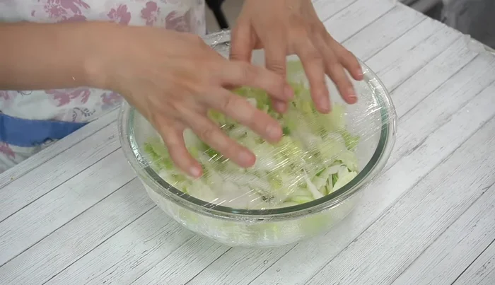 Let the cabbage cool. Squeeze out excess moisture thoroughly. This step helps the flavors penetrate better.