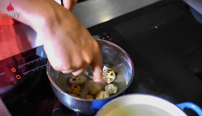Peel the eggs. If the shells are difficult to peel, add vinegar to the cold water to break down the calcium in the shell. This creates a more leather-like texture, making peeling much easier.