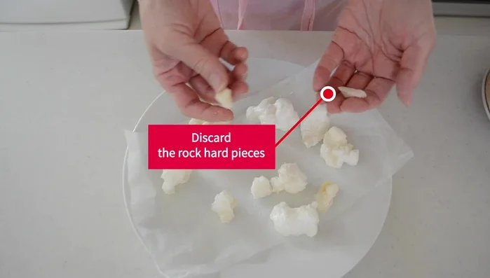Carefully remove the hot mochi from the microwave and transfer to a bowl.