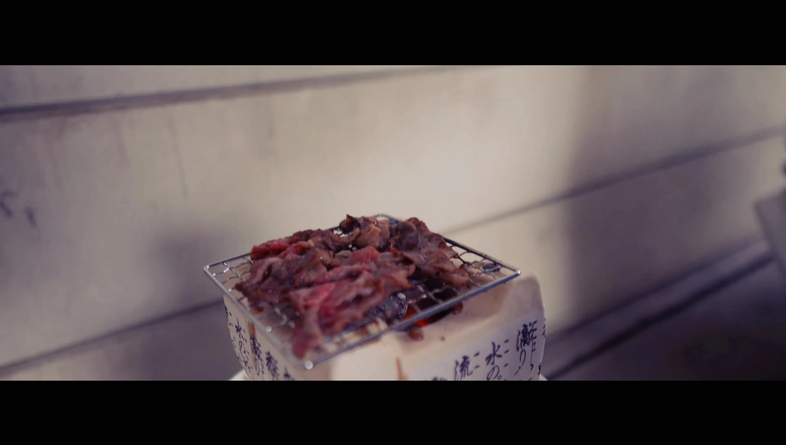 Korean short ribs grilling on mini grill