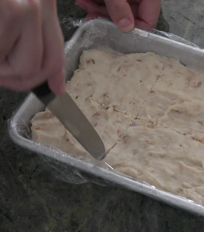Divide the chilled mixture into six equal pieces and shape into cylinders.