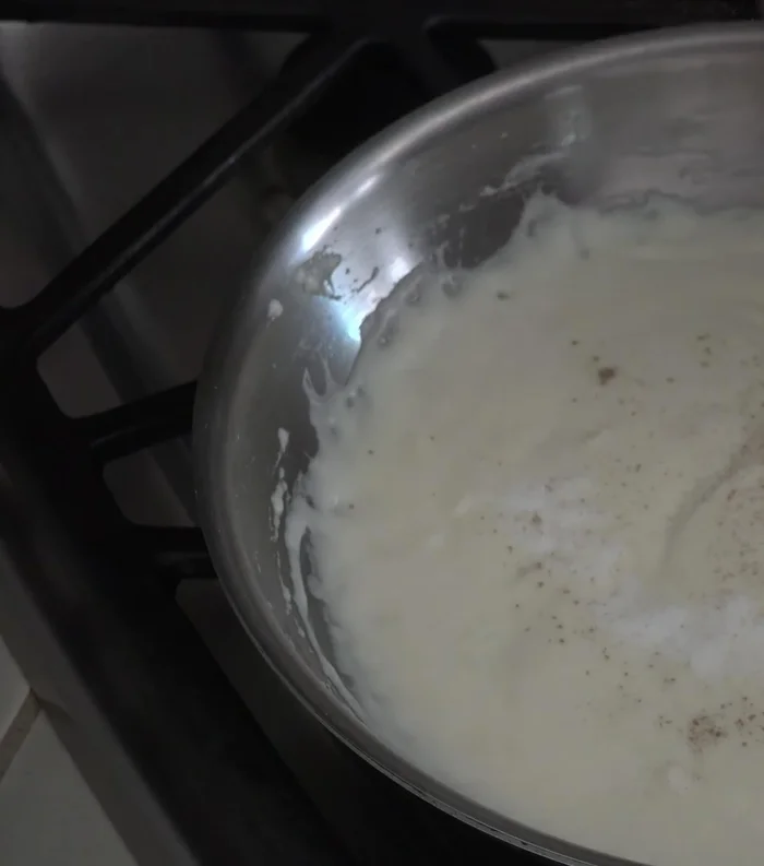 Turn off heat, season with salt and pepper. Stir in crab meat.