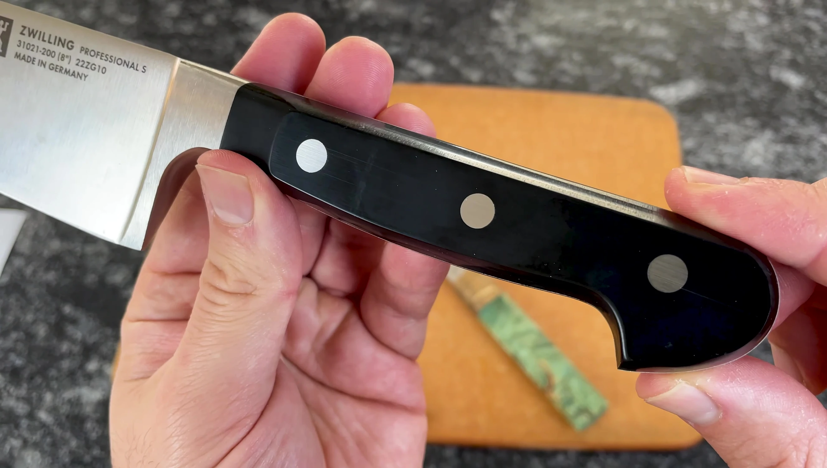 German knife with a synthetic handle