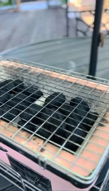 Shot of the grill in use, showing the efficient heat distribution.