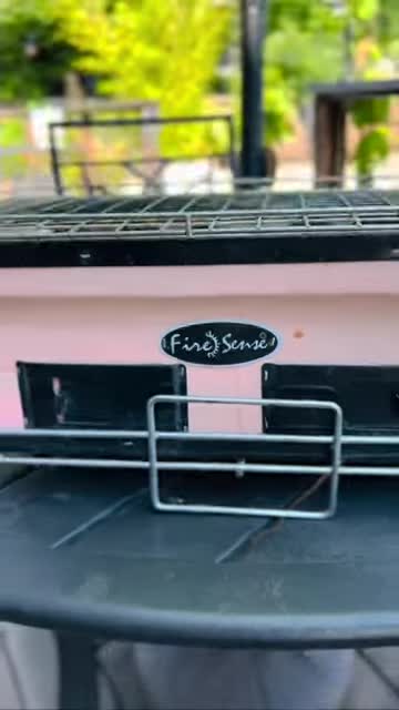 Close-up of the compact Fire Sense Yakitori Grill on a tabletop.