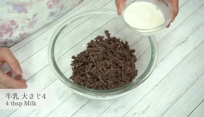 Combine the chopped chocolate and milk in a heat-resistant bowl. Microwave at 600W for 1 minute, stirring well. If needed, heat in 20-30 second increments until completely melted.