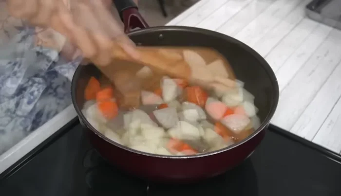 Reduce heat to low, cover, and simmer for 6 minutes.