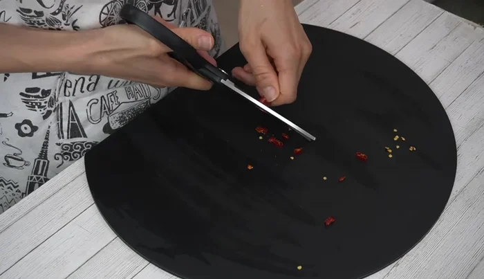 After 5 minutes, squeeze out the excess water from the cucumbers and put them in a plastic bag.