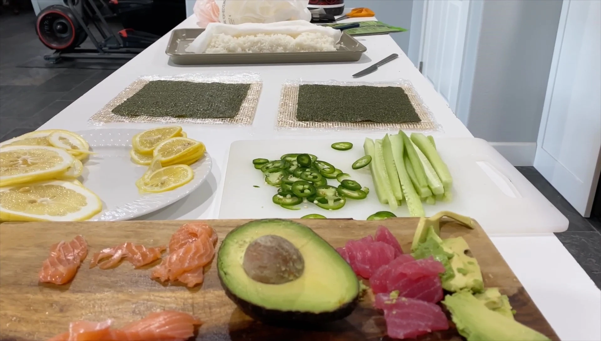 The chef begins assembling the sushi, showcasing the process.
