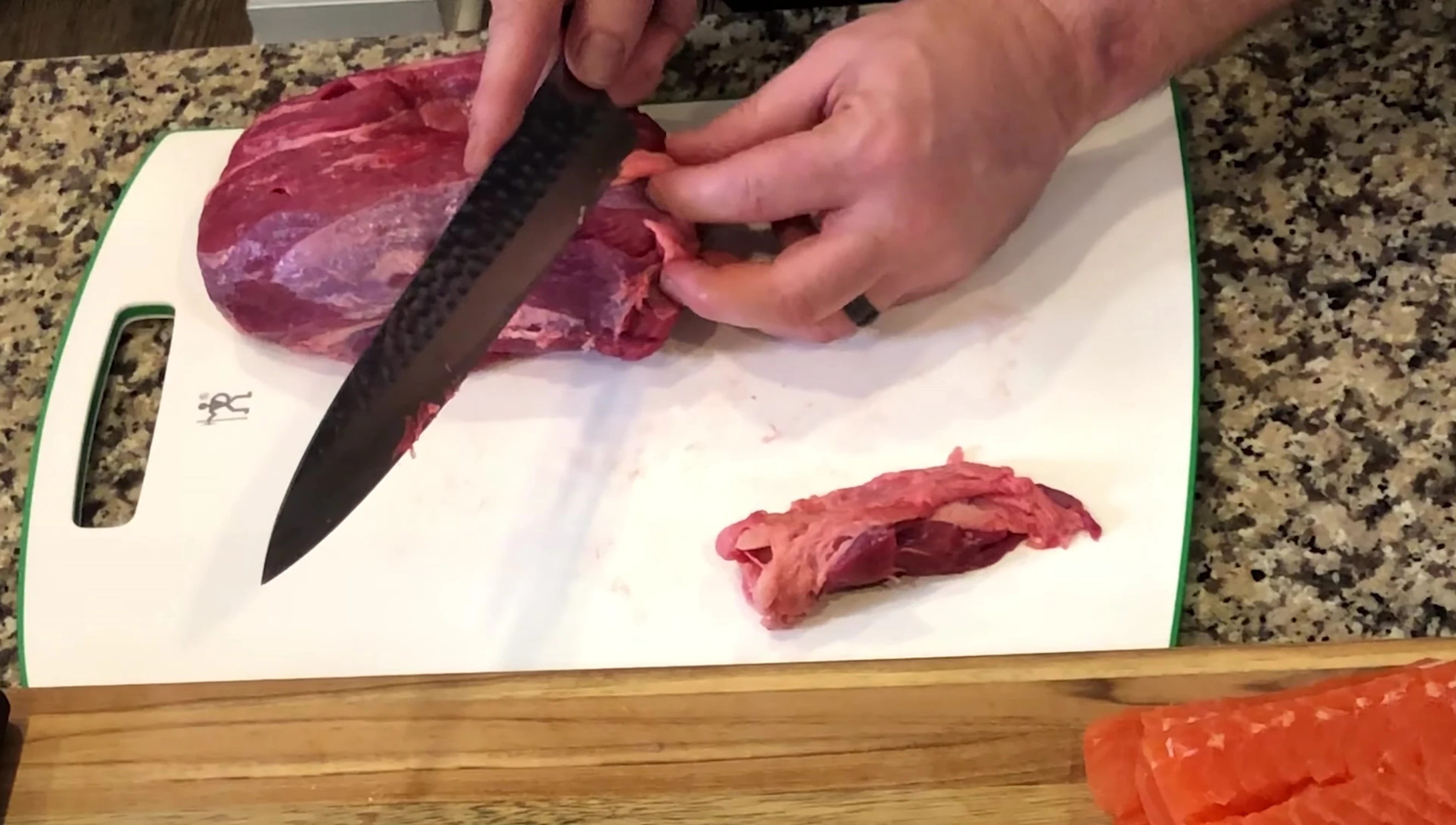 Sujihiki knife carving meat.