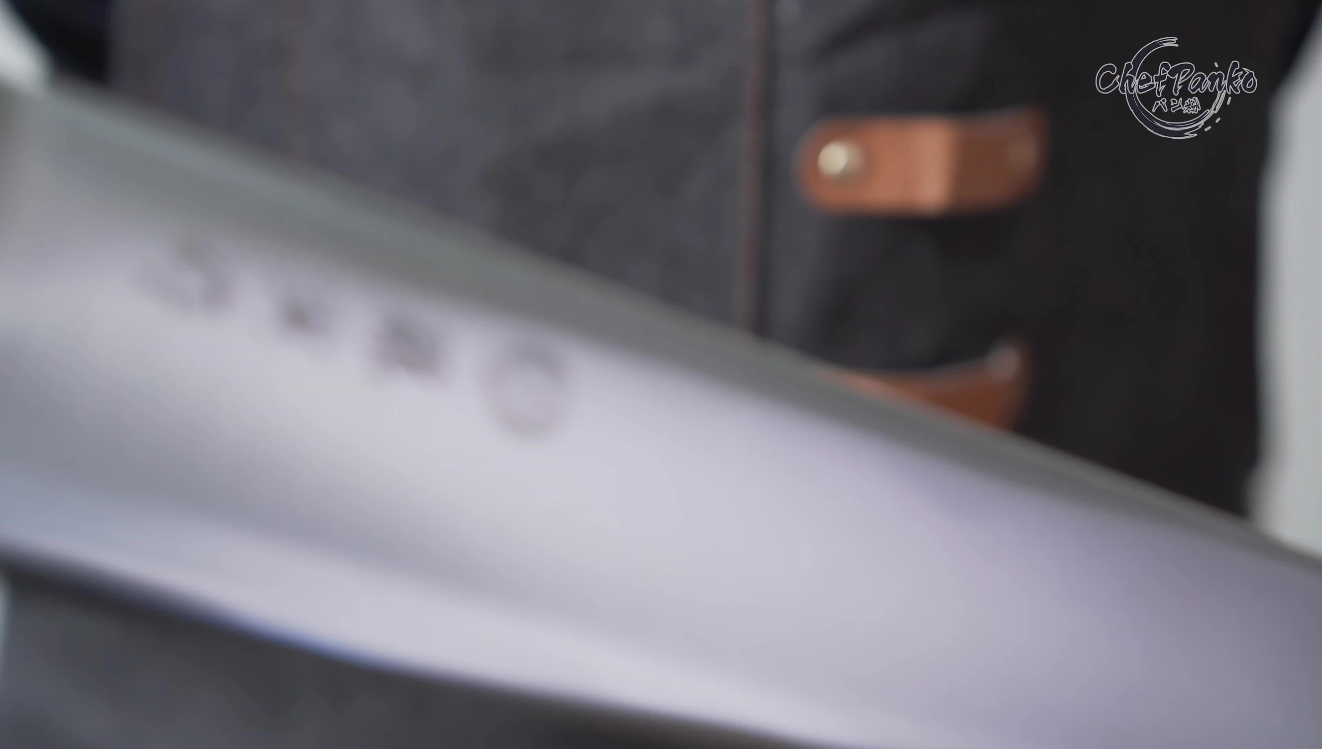The knife's full tang construction and handle.
