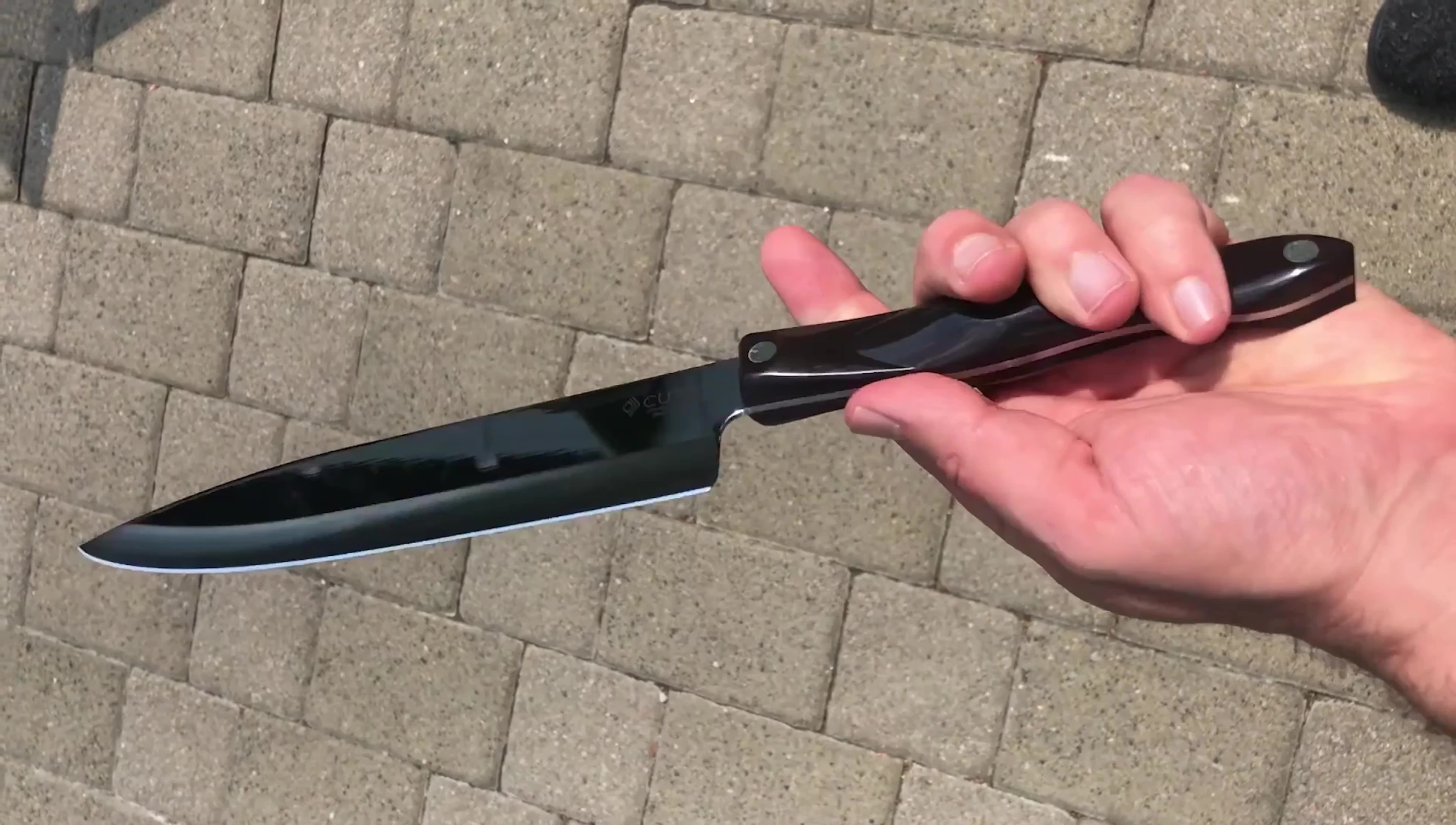 Cutco logo and knives
