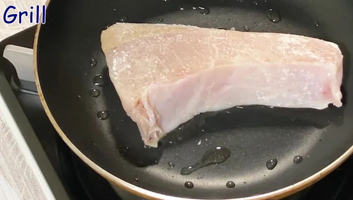 Place the fish in the pan and grill until browned on both sides. [393.639]