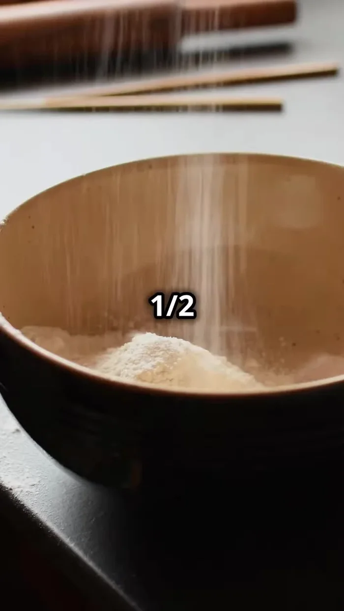 Make the Chi-Chi Dango layer: Mix mochi, sugar, and water in a pot. Stir until smooth. Place over medium heat and keep stirring until it turns into a thick, sticky paste. Add food coloring if desired.