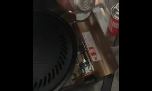 Aligning the notches on the grill top.