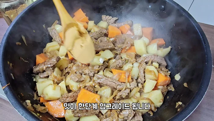 Add peanut butter and stir-fry well.