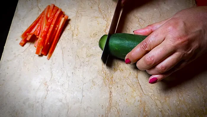 **For Salmon Sushi Roll:** Arrange thin strips of carrot and cucumber, then smoked salmon on the rice. Lift with the polythene sheet and roll tightly. Cut into bite-sized pieces.