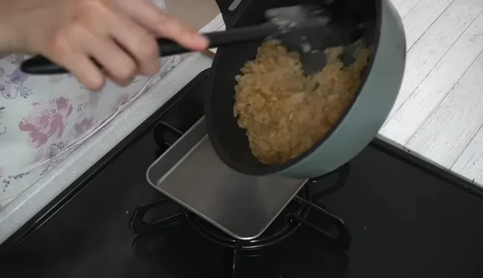 Remove fried onions from pan, spread them on a tray to cool.