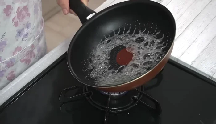 Reduce heat to low, and continue cooking until a nice caramel color is achieved. Pour in hot water (carefully!), stir, and let cool.