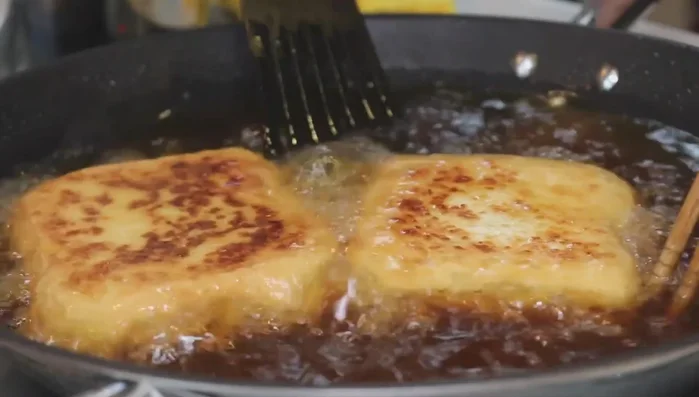Once both sides are golden brown and crispy, increase heat to medium-high for a few more minutes to ensure even crispness.