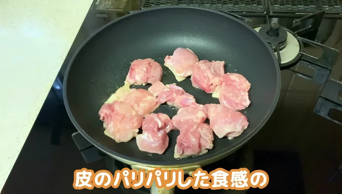 Cook the chicken in a pot until the skin is lightly browned, releasing oils from the skin. Don't cook it fully at this stage.