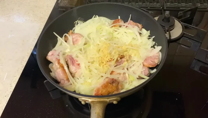 Add ginger, water, soy sauce, and mirin to the pot. Bring to a simmer.