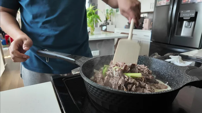 Add the beef to the pan and cook together for about 4-5 minutes.