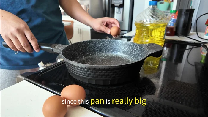 Cook eggs. Heat oil in a pan. Pour eggs into the pan and cook until edges are golden brown but the center is still runny.