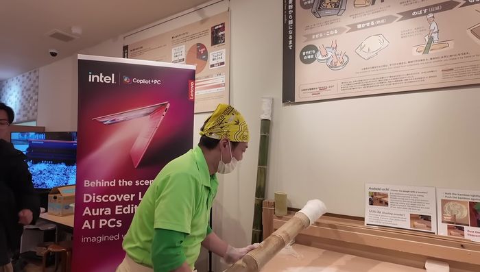 Using the bamboo rolling pin, carefully roll and flatten the dough. Keep your right hand straight and centered on the dough, using your left hand to assist.