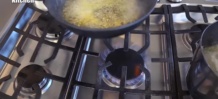 Add about a cup of boiling water to the pan.