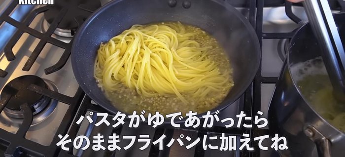 Add the cooked spaghetti (without draining the water) to the pan. Stir to combine.