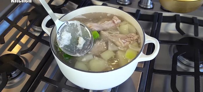 Remove excess foam during simmering (270.039).