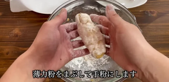 Lightly dust the dough with flour, then divide it into four equal parts.