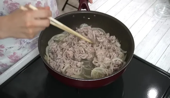 Continue cooking, stirring occasionally, until the mixture boils. Adding sweet ingredients first enhances the meat's softness and flavor.