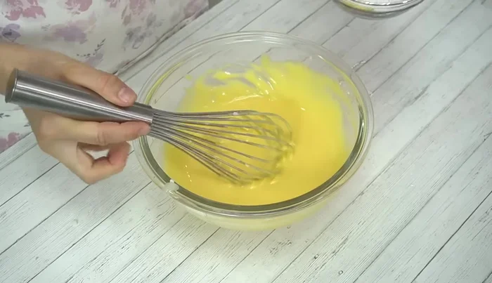 Add eggs and mix well. Add about half the sugar and mix until no longer crunchy.