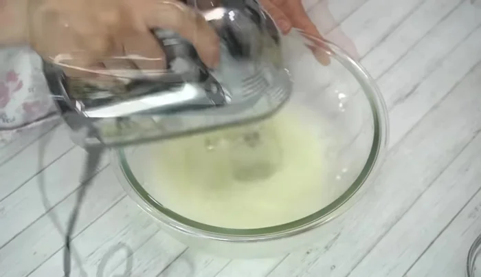 Beat egg whites on high speed with a hand mixer until fluffy. Add all the sugar and beat on high speed for 1 minute, then on low speed for 1 minute.