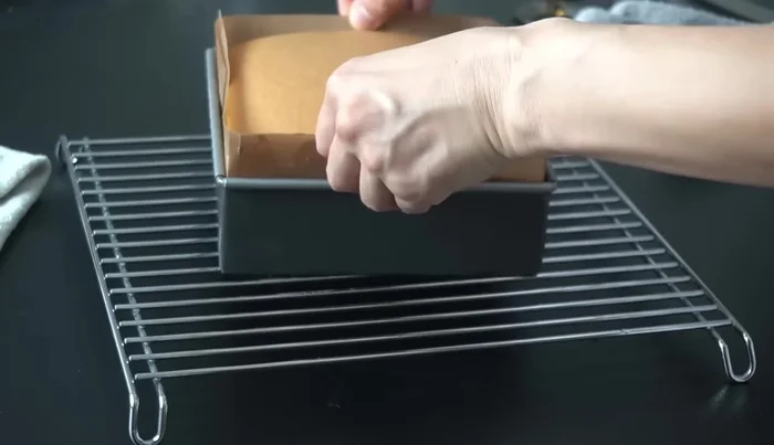 Let the cake cool slightly, then remove from the pan.