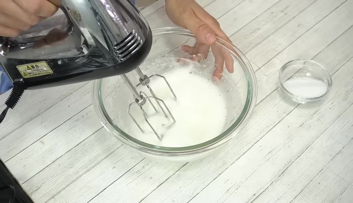 Add half the granulated sugar, beat on high speed for 30 seconds.