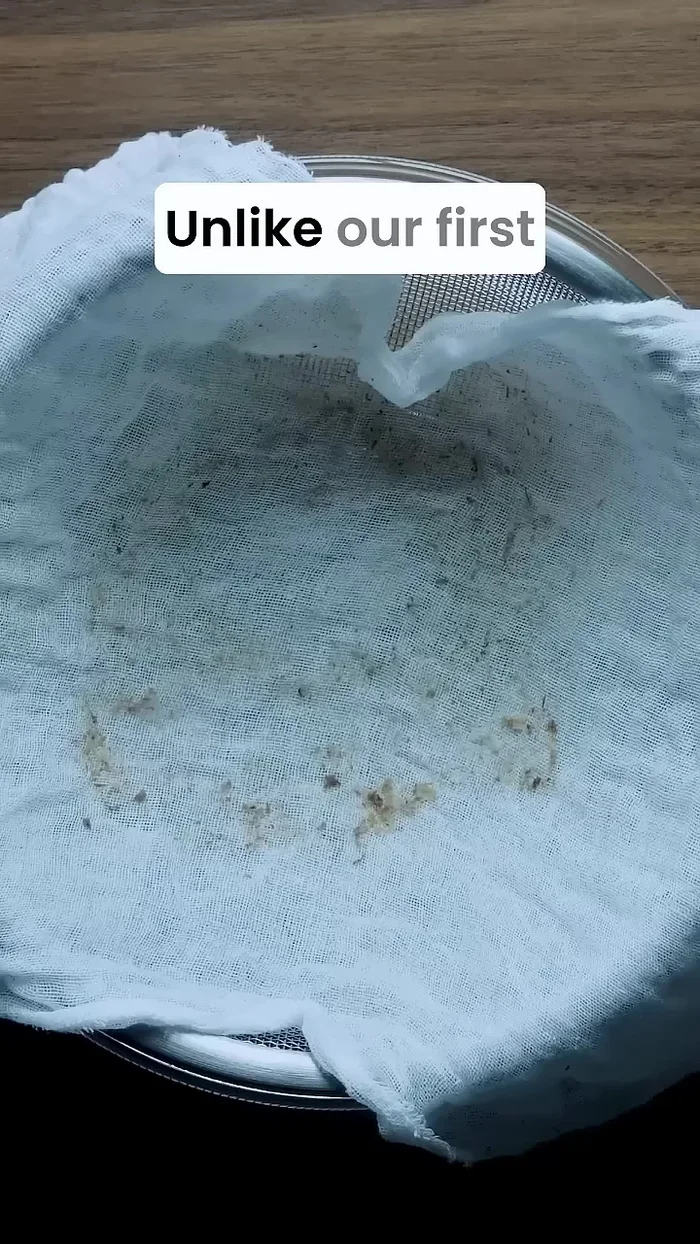 Strain again. Press and squeeze the solids to extract maximum flavor.