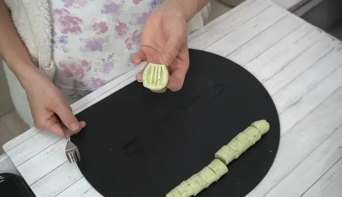 Mash each piece with a fork to remove air and prevent bursting (303.32).