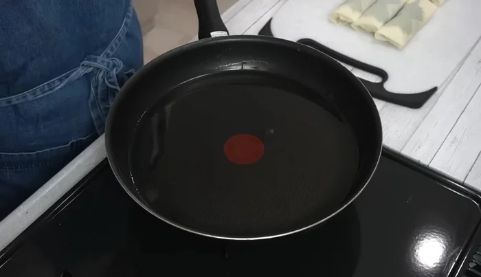 Heat frying oil to 170°C (389.72)