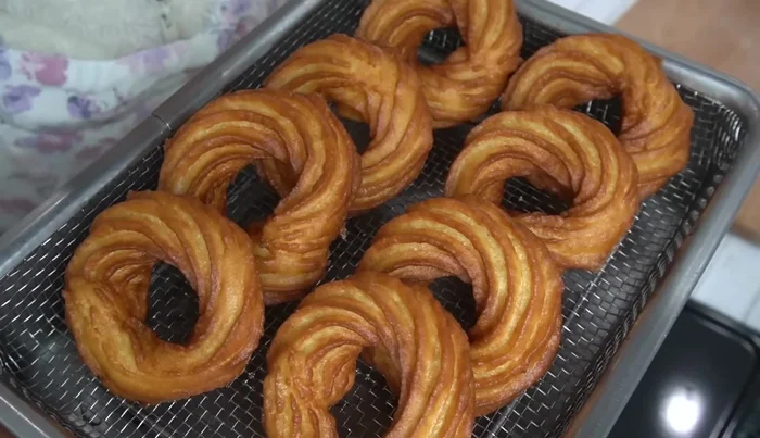 Remove donuts and drain excess oil.