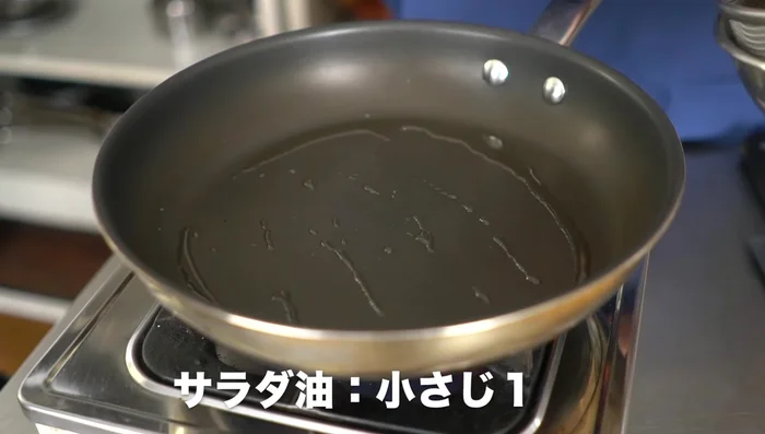 Heat oil in a frying pan. Add broccoli stalks, salt, and steam over low-medium heat for about 2.5 minutes.