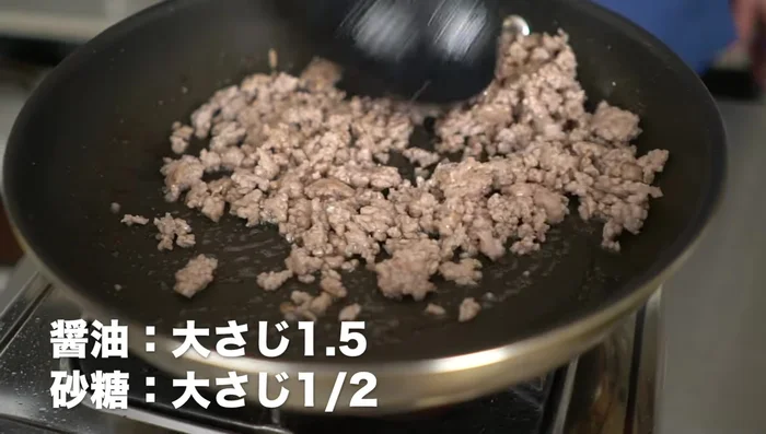 Add sugar and brown it, then add soy sauce and mix well. Turn off the heat.
